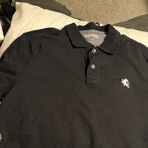Express Black Polo with Contrasting White Embroidered Lion